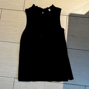 Black sleeveless blouse